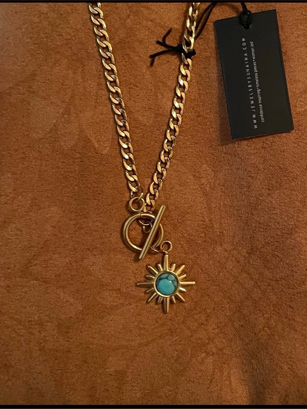 JEWELS BY SUNAINA x
TUSHITA The Sol Necklace 16"
Gold Tone Turquoise Sunburst